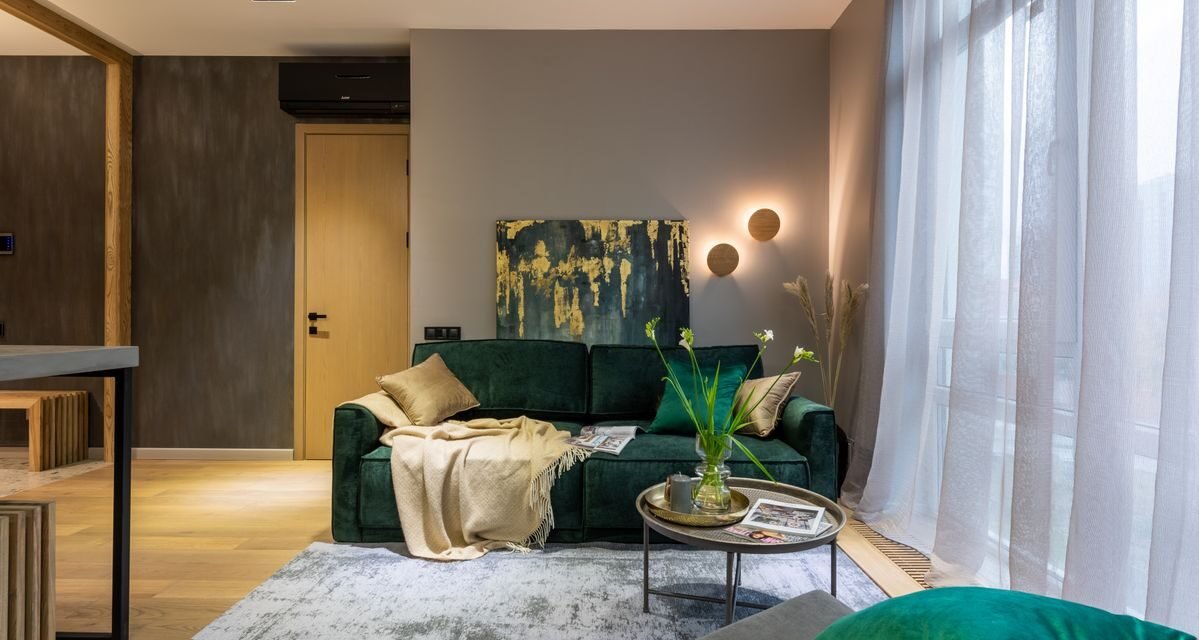 Modern rented apartment living room with sofa and furnishings a tenant would insure