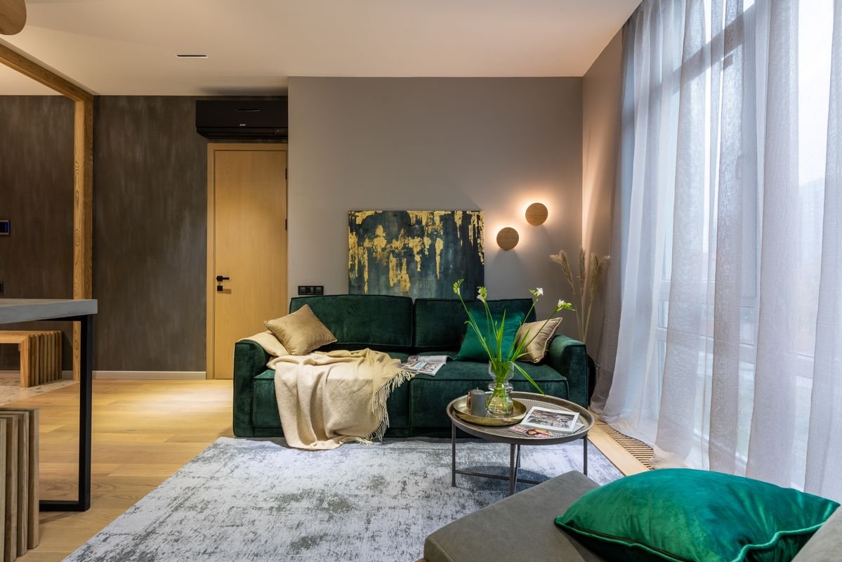 Modern rented apartment living room with sofa and furnishings a tenant would insure