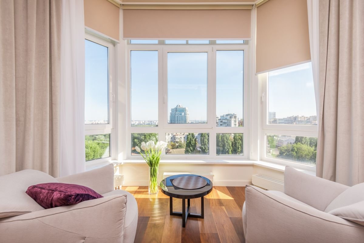 Bright modern apartment living room representing UAE home insurance coverage